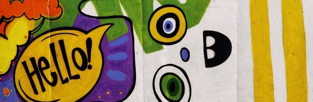 colorful artistic rendering of a cat says hello