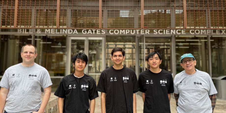 Professors Etienne Vouga and Glenn Downing with UTPC student members Aaryan Prakash, Caleb Hu, Mark Wen in front of the Gates Dell Complex.