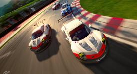race cars rounding corner on race track