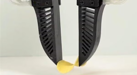 Robot hands holding potato chip