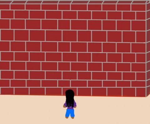 A young girl faces a tall brick wall.