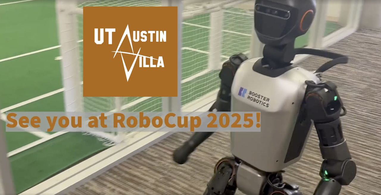 Booster T1 robot on an indoor soccer field