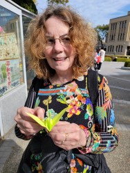 Elaine folding a crane