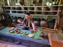 man with pots and ingredients