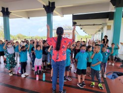 children singing in Chamorro